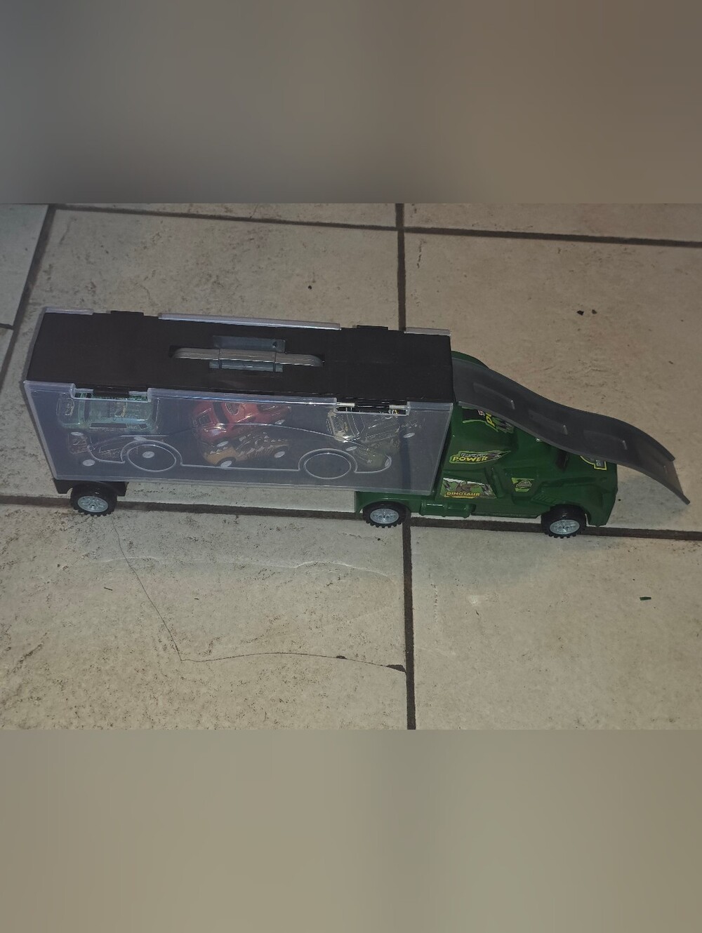 RARE HOTWHEELS SEMITRUCK CAR HOLDER HAULER - DINOSAUR DINO TRUCK + Contents